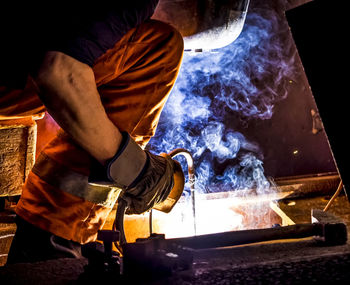 Low section of man working