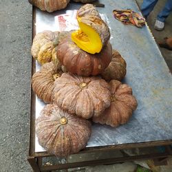 High angle view of pumpkins for sale at market stall