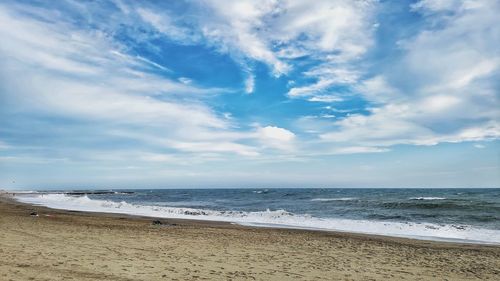 Scenic view of beach against sky