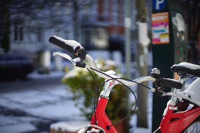 Close-up of bicycle on city street