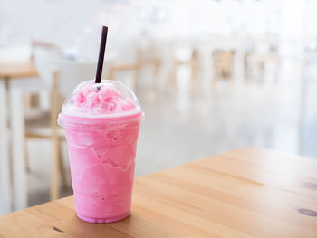 Close-up of smoothie on wooden table