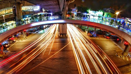 High angle view of light trails on road at night