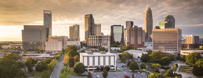 Modern buildings in city against sky
