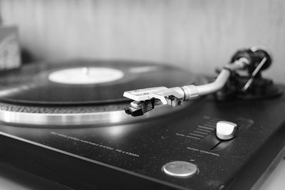 Close-up of turntable on table