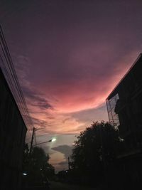 Low angle view of building at sunset