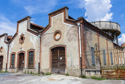 Low angle view of old building against sky