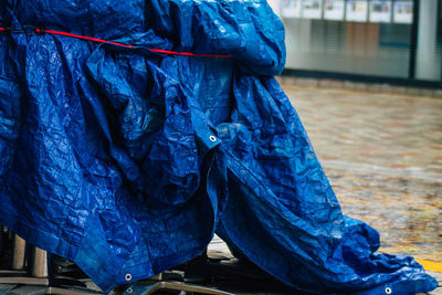 Close-up of woman standing on wet floor