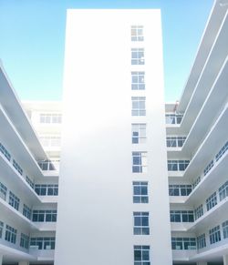 Modern office building against clear sky