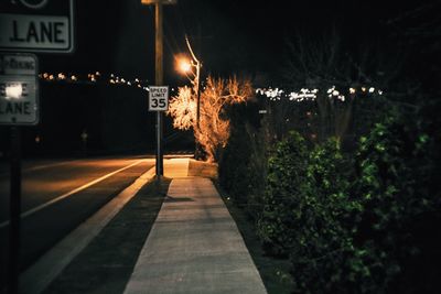 Illuminated street light at night