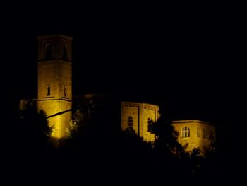 Low angle view of illuminated building at night