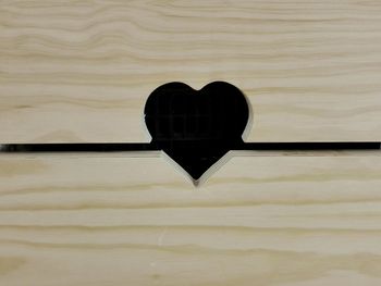 Close-up of heart shape on wood