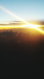 Scenic view of landscape against sky during sunset