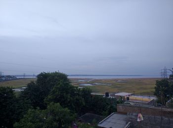 High angle view of sea against cloudy sky