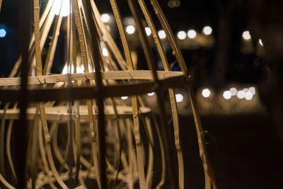 Low angle view of illuminated lights at night