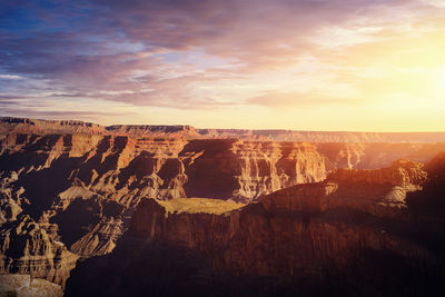 Scenic view of landscape against sky during sunset