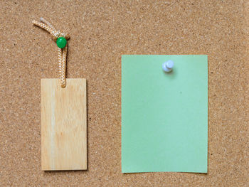 High angle view of green paper on table