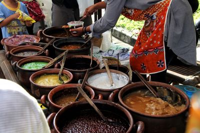 Midsection of woman preparing food