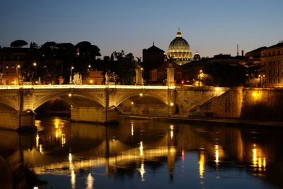 Reflection of illuminated buildings in water