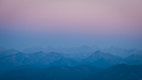 Scenic view of mountains against sky during sunset