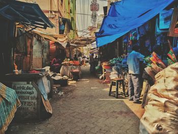 People on street market in city