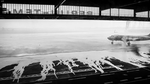 High angle view of airport by sea against sky