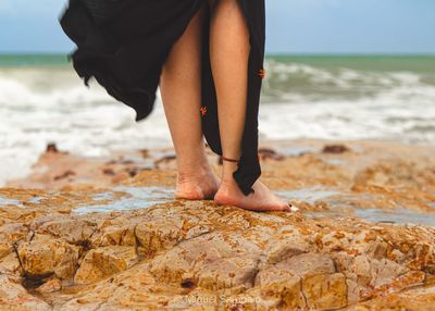 Low section of person on beach