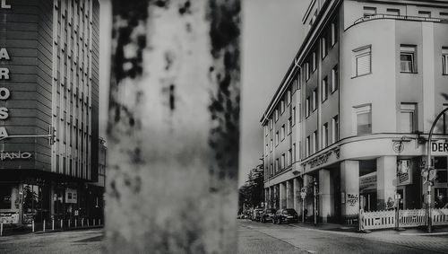 Street amidst buildings against sky