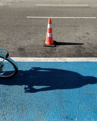 High angle view of bicycle sign on road