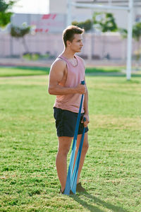 Full length of man standing on field