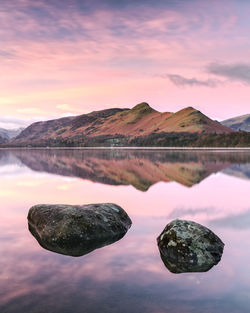 Scenic view of lake against romantic sky