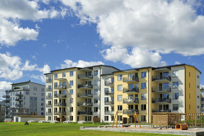 Buildings in city against sky