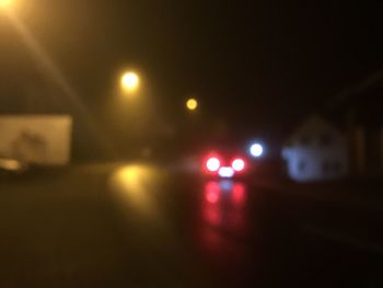 High angle view of illuminated street lights at night