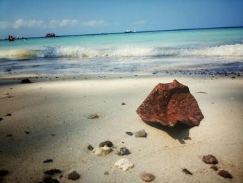 Scenic view of beach against sky