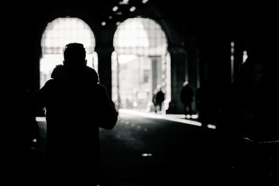 Silhouette of woman at night