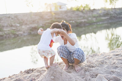 Portrait of happy loving mother and her baby outdoors. person