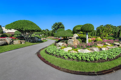 Fountain in park against clear sky