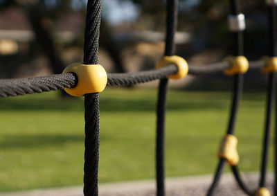 Full frame shot of rope fence at park