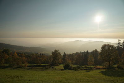 Scenic view of landscape against sky during sunset