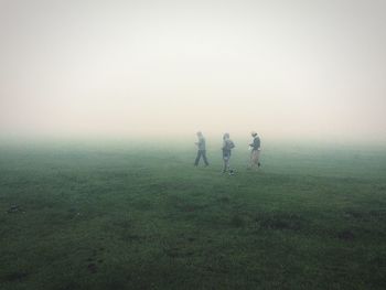 Scenic view of landscape in foggy weather