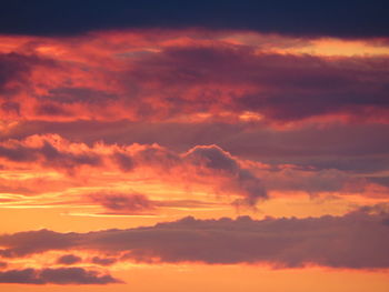 Low angle view of dramatic sky during sunset