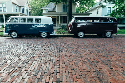 Close-up of car on street in city