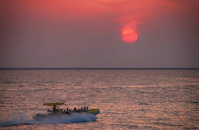 Scenic view of sea at sunset