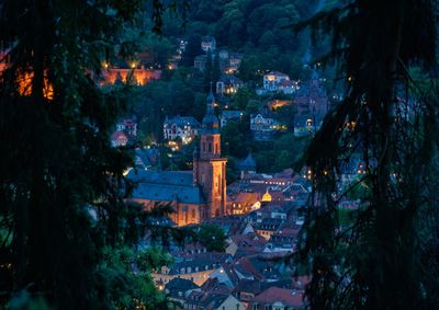 Illuminated buildings in city at night