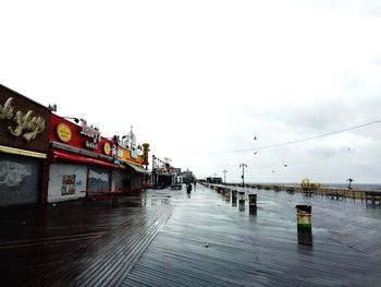 Pier over sea against sky