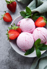 Homemade strawberry ice cream with fresh strawberries. sweet berry summer dessert. 