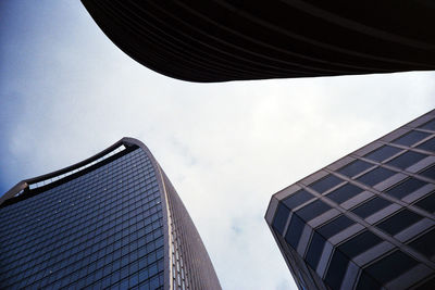 Low angle view of skyscrapers against sky