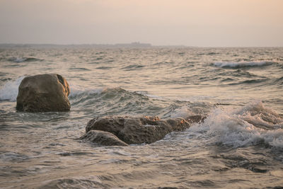 Scenic view of sea against sky during sunset