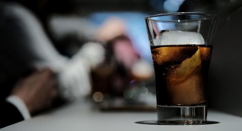 Close-up of beer glass on table