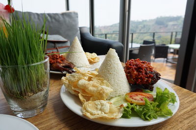 Close-up of food served on table