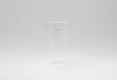 Close-up of glass of water against white background